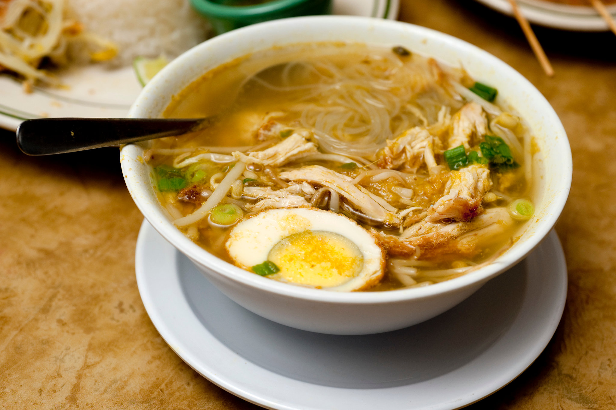 Soto ayam Bangka in traditional bowl